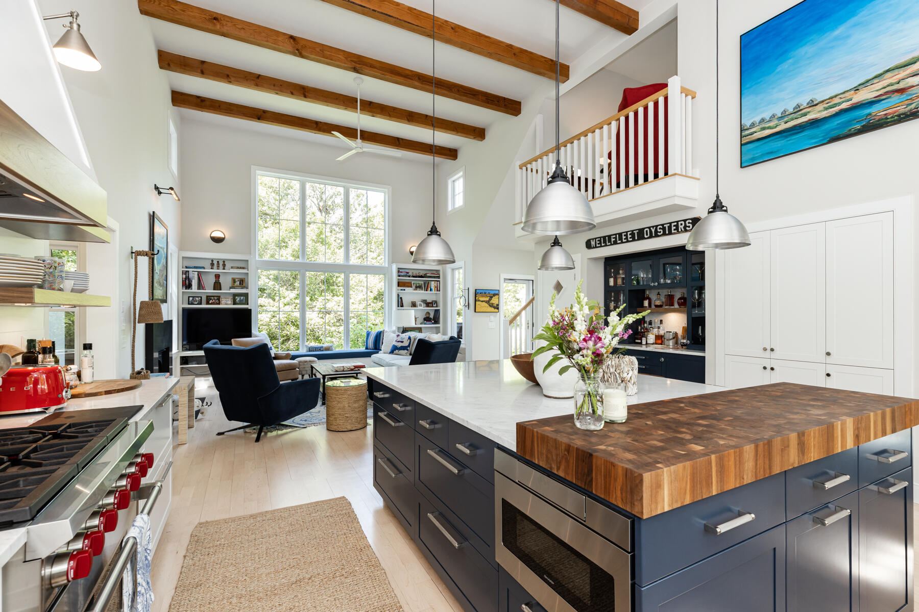 145 Henry's Road Brewster, MA 02631 - Photo 8 of 54 a large kitchen with stainless steel appliances granite countertop a stove and a dining table