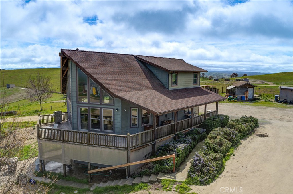 a house view with a garden space