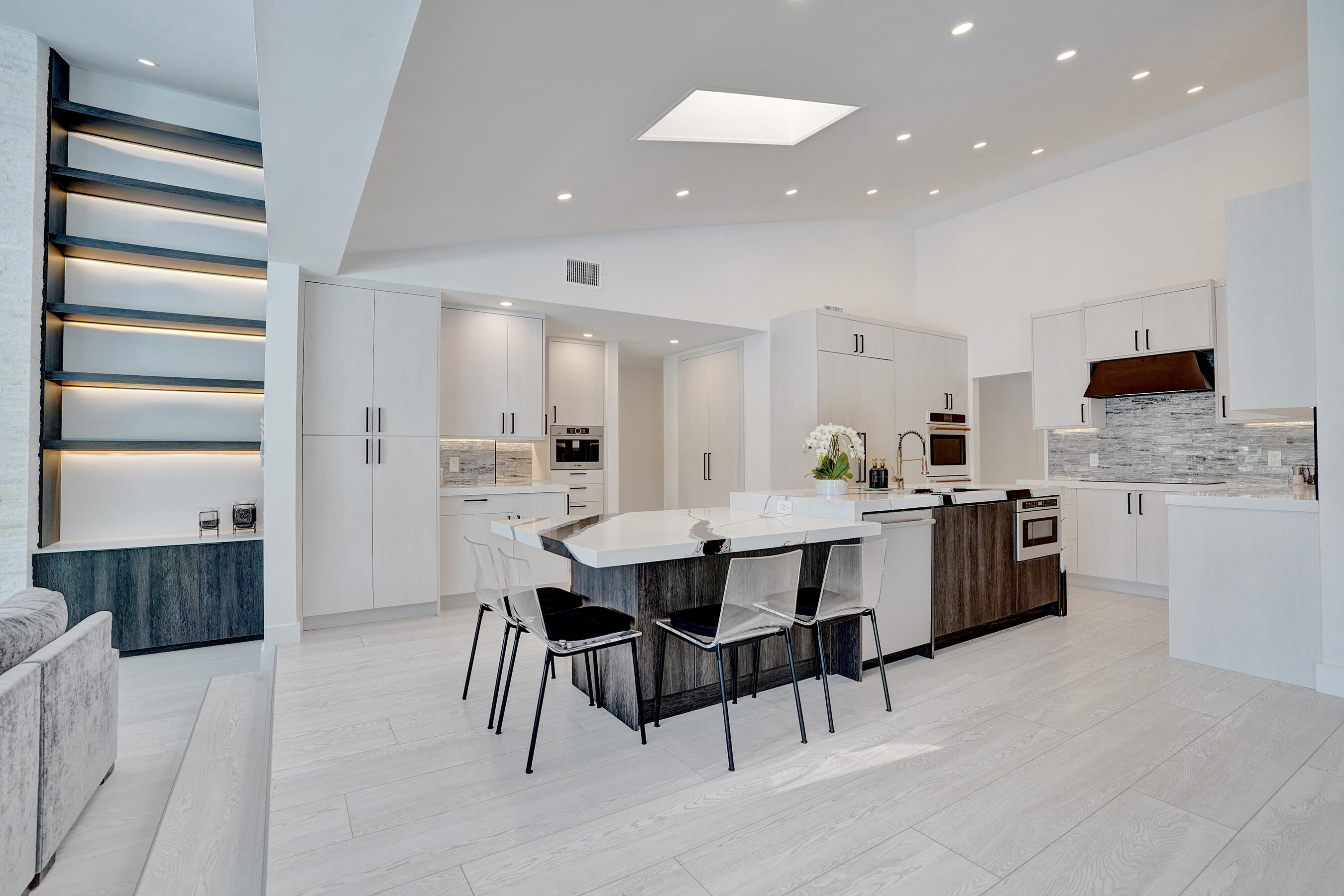 4130 Georges Way Boca Raton, FL 33434 - Photo 25 of 69 a large kitchen with a table and chairs