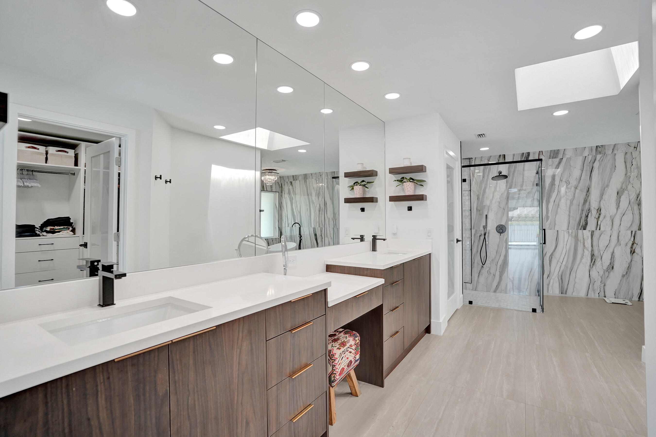 4130 Georges Way Boca Raton, FL 33434 - Photo 46 of 69 a spacious bathroom with a double vanity sink mirror double and shower