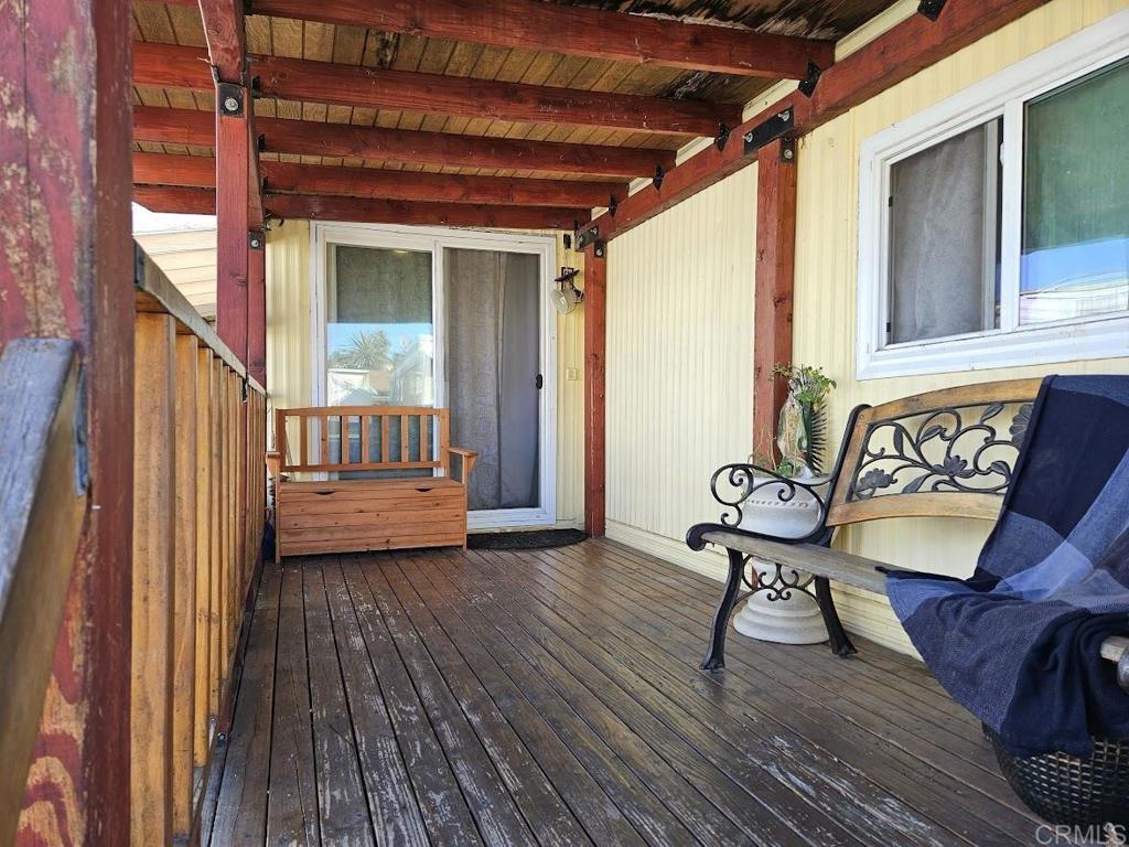 3173 Bancroft Drive, Unit SPC 5 Spring Valley, CA 91977 - Photo 1 of 1 a view of a porch with furniture and a gate