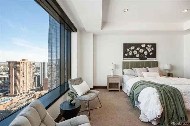 a bed room with a bed and a couch