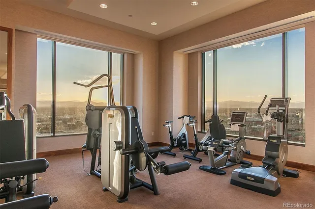 a swimming pool with outdoor seating and yard