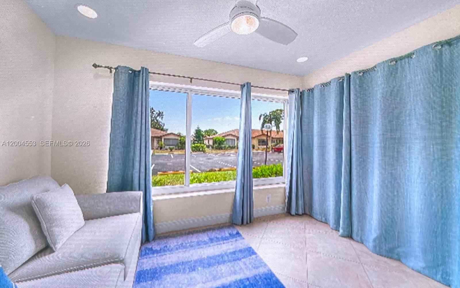 13990 Nesting Way, Unit C Delray Beach, FL 33484 - Photo 8 of 18 a view of an empty room and window