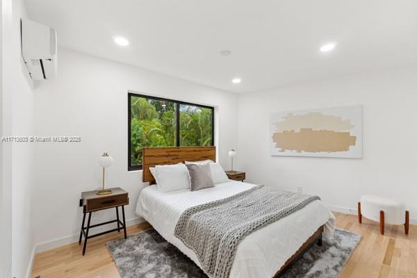 1024 Southwest 23rd Road Miami, FL 33129 - Photo 24 of 33 a bedroom with a bed and a window