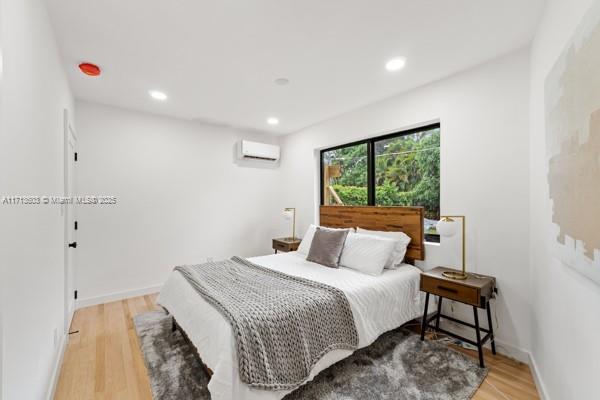 1024 Southwest 23rd Road Miami, FL 33129 - Photo 25 of 33 a bedroom with a bed and a window