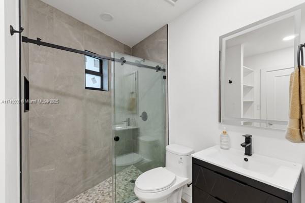 1024 Southwest 23rd Road Miami, FL 33129 - Photo 26 of 33 a bathroom with a sink toilet and shower