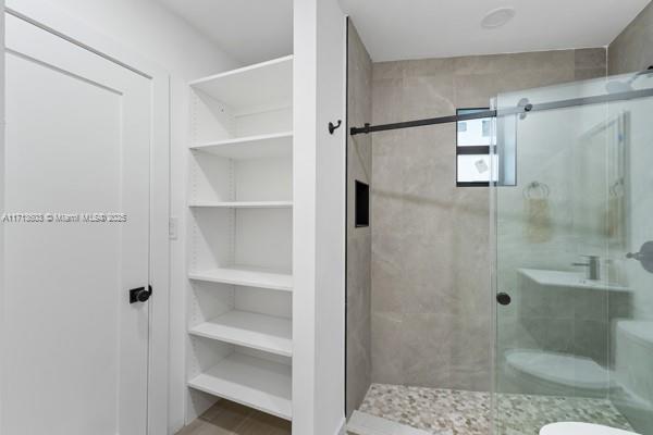 1024 Southwest 23rd Road Miami, FL 33129 - Photo 27 of 33 a bathroom with a shower