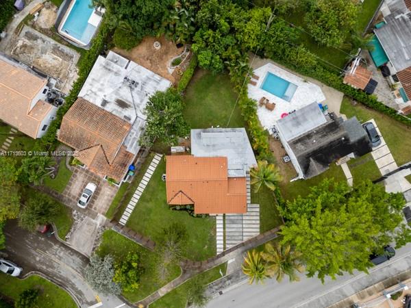 1024 Southwest 23rd Road Miami, FL 33129 - Photo 33 of 33 an aerial view of a house with a yard and lake view
