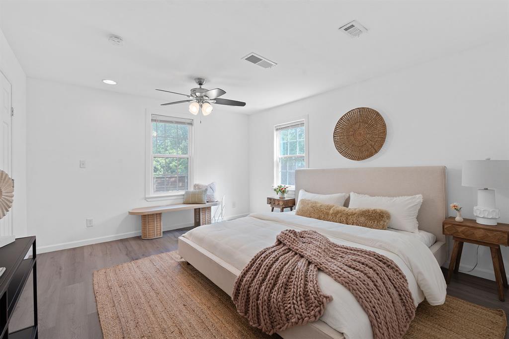 1156 Nickols Avenue Austin, TX 78721 - Photo 11 of 23 a bedroom with a bed and a window