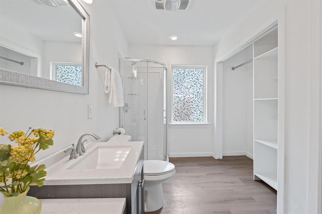 1156 Nickols Avenue Austin, TX 78721 - Photo 16 of 23 a bathroom with a sink toilet and shower