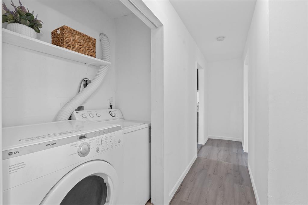 1156 Nickols Avenue Austin, TX 78721 - Photo 18 of 23 a view of a hallway with washer and dryer