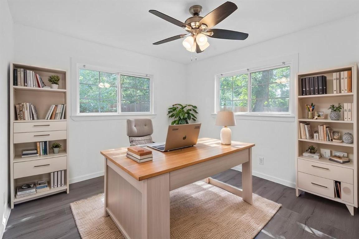 1156 Nickols Avenue Austin, TX 78721 - Photo 21 of 23 a view of a workspace with furniture and a window