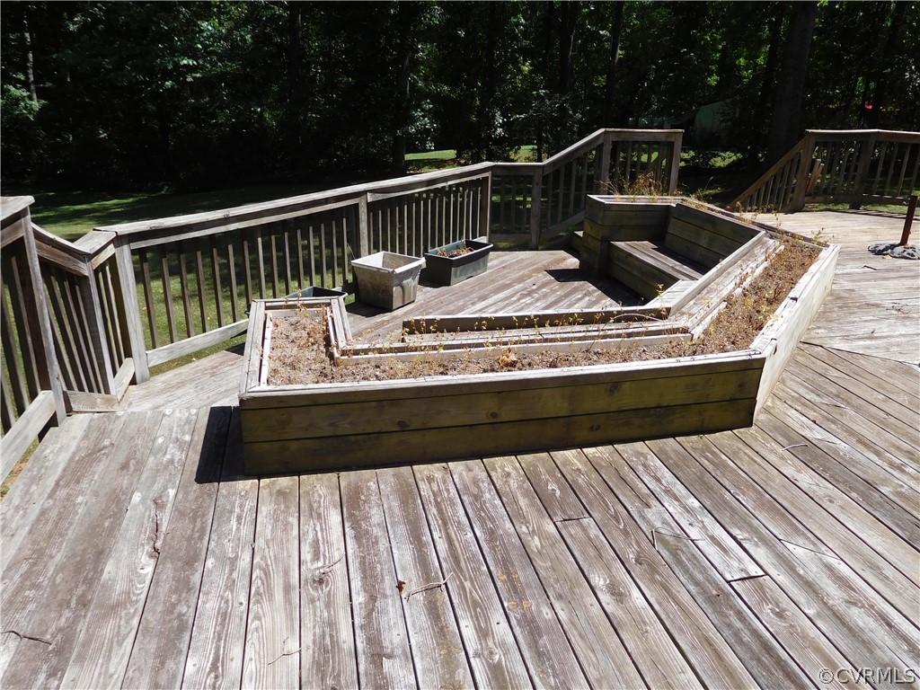 1756 Reams Road Powhatan, VA 23139 - Photo 15 of 15 Rear deck with built in seating overlooking the re