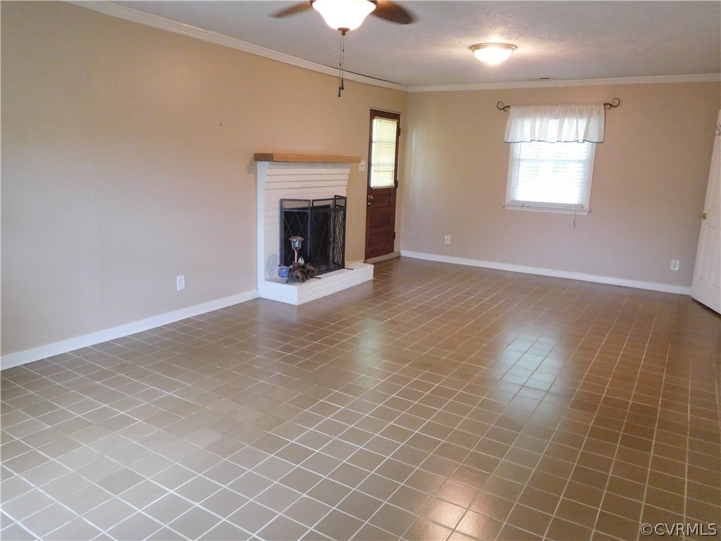 1756 Reams Road Powhatan, VA 23139 - Photo 6 of 15 Extra large family room with a wood burning, brick