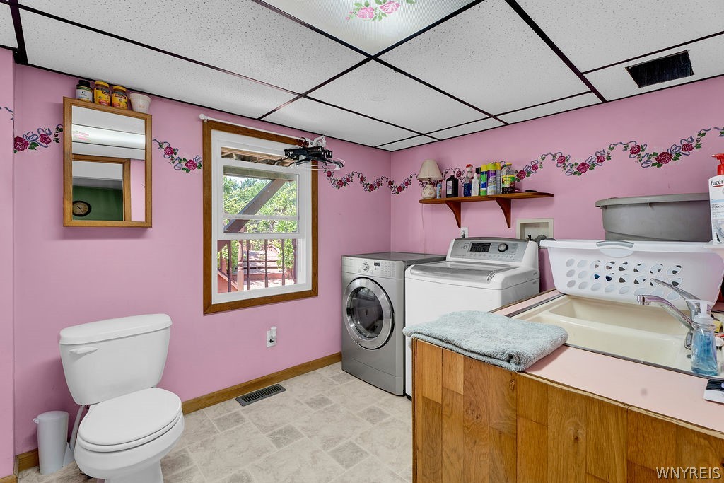 4015 Mapleton Road Wheatfield, NY 14120 - Photo 10 of 49 first floor bathroom/Laundry room
