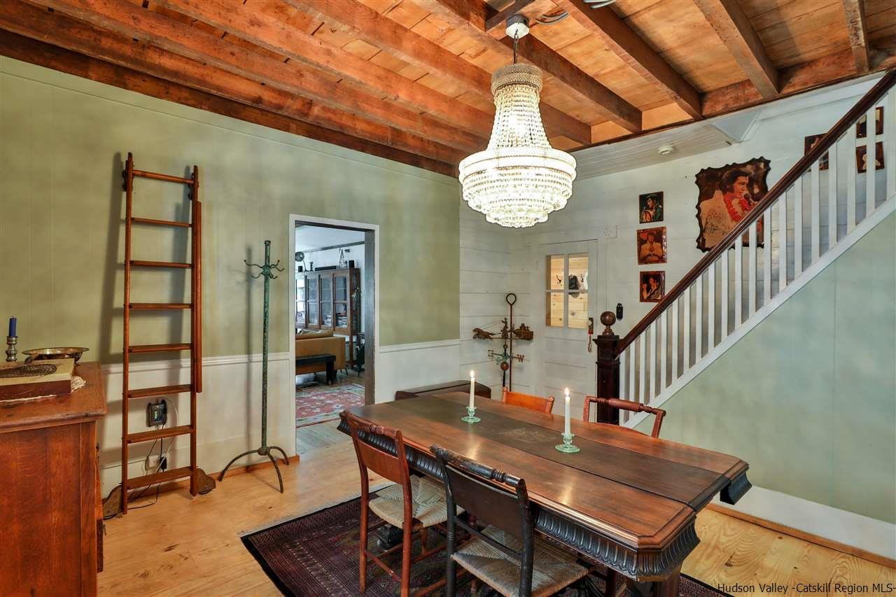499 County Route 3 Fleischmanns, NY 12430 - Photo 11 of 25 a view of a dining room with furniture and chandelier