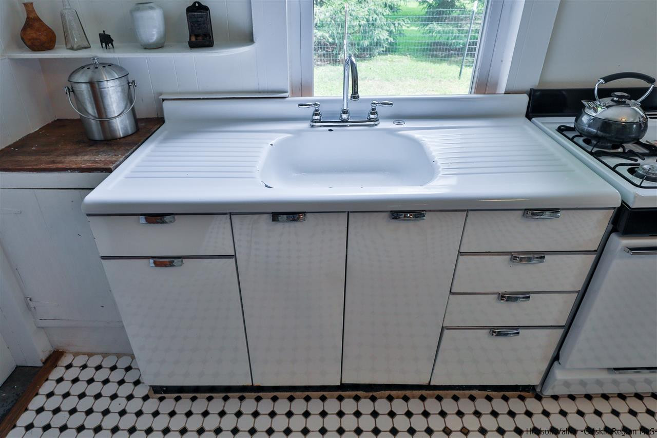 499 County Route 3 Fleischmanns, NY 12430 - Photo 16 of 25 a bathroom with a sink and a mirror