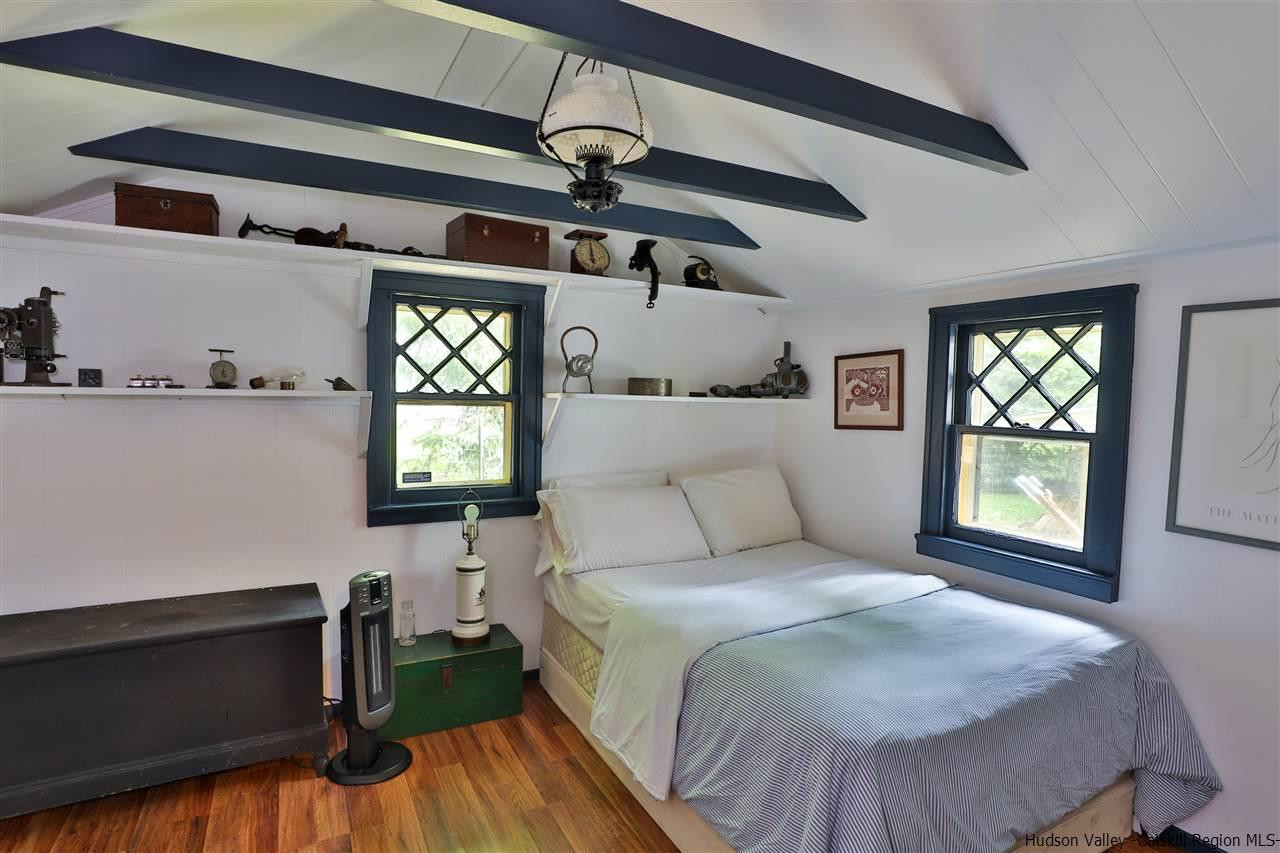 499 County Route 3 Fleischmanns, NY 12430 - Photo 17 of 25 a bedroom with a bed and a window