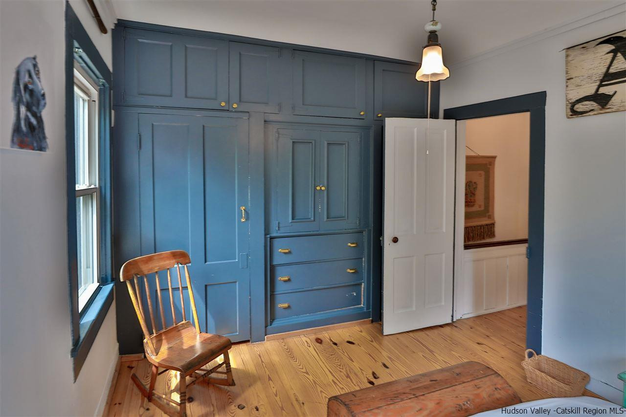 499 County Route 3 Fleischmanns, NY 12430 - Photo 22 of 25 a bedroom with a bed and wooden floor