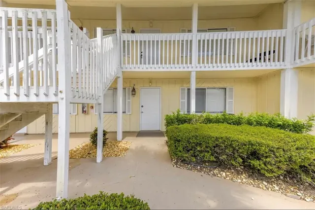 a view of street with parked cars