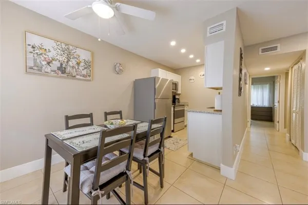 a view of a dining room with furniture