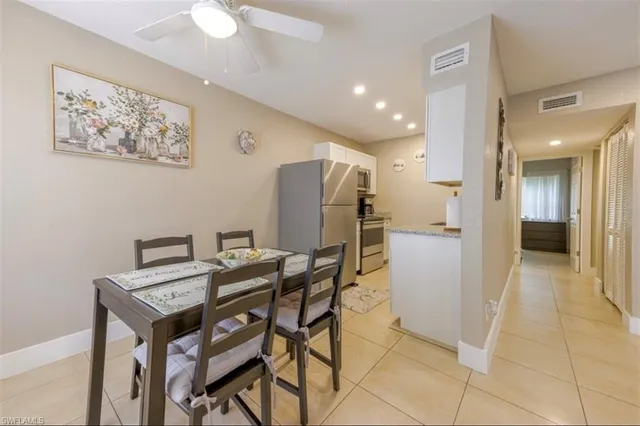 a view of a dining room with furniture