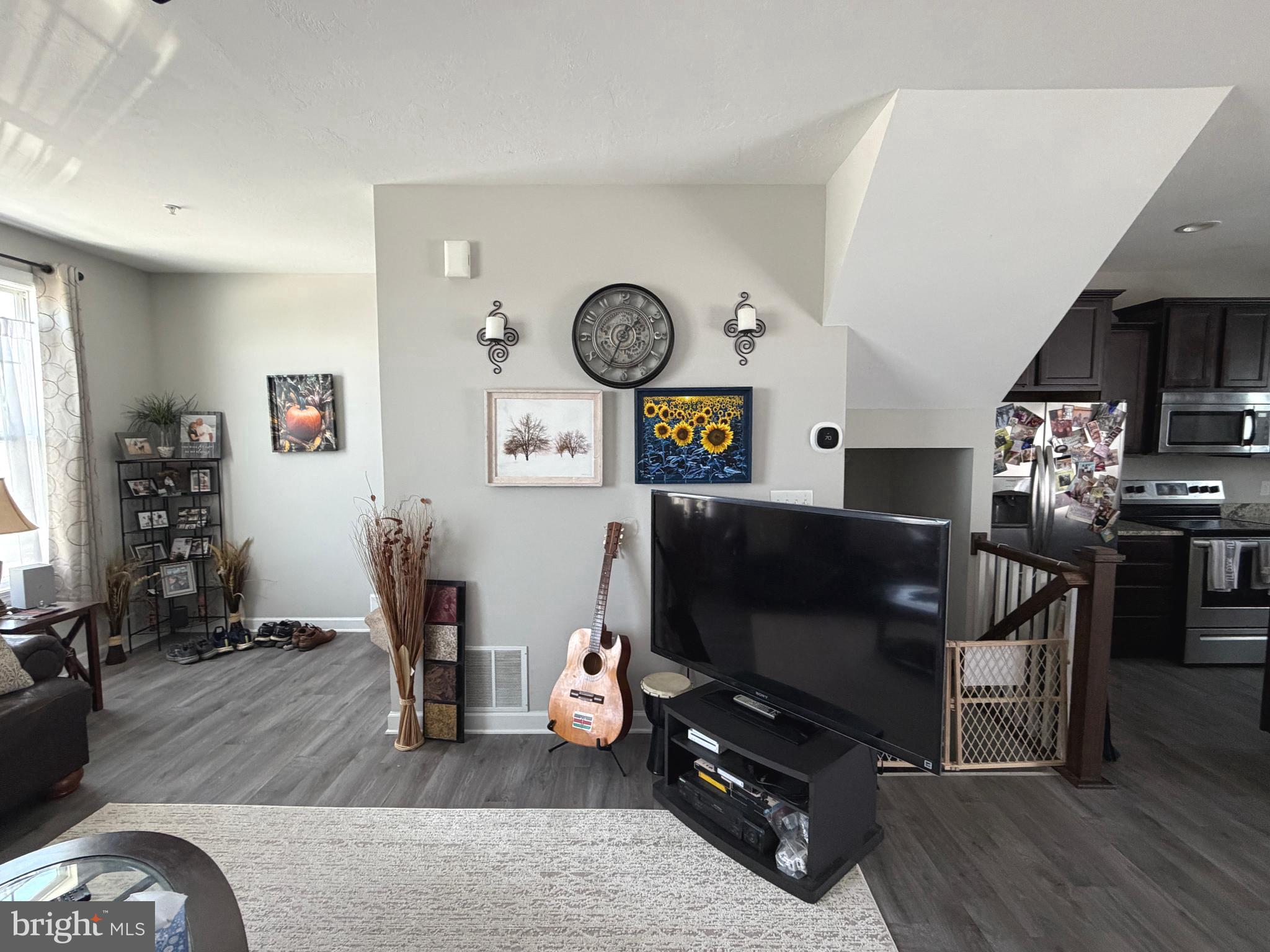 522 Charles Avenue Hanover, PA 17331 - Photo 33 of 59 a living room with furniture and a flat screen tv