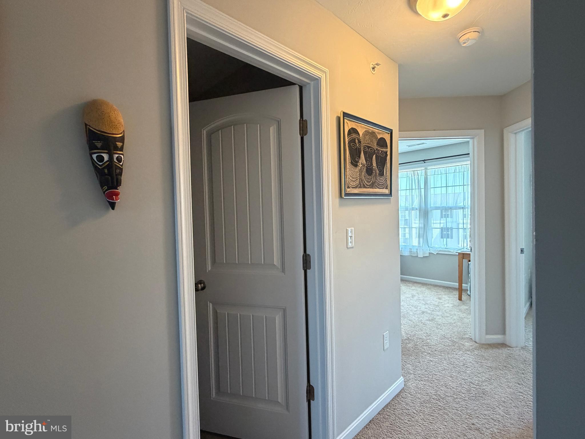 522 Charles Avenue Hanover, PA 17331 - Photo 35 of 59 a view of a hallway with wooden floor and a bathroom