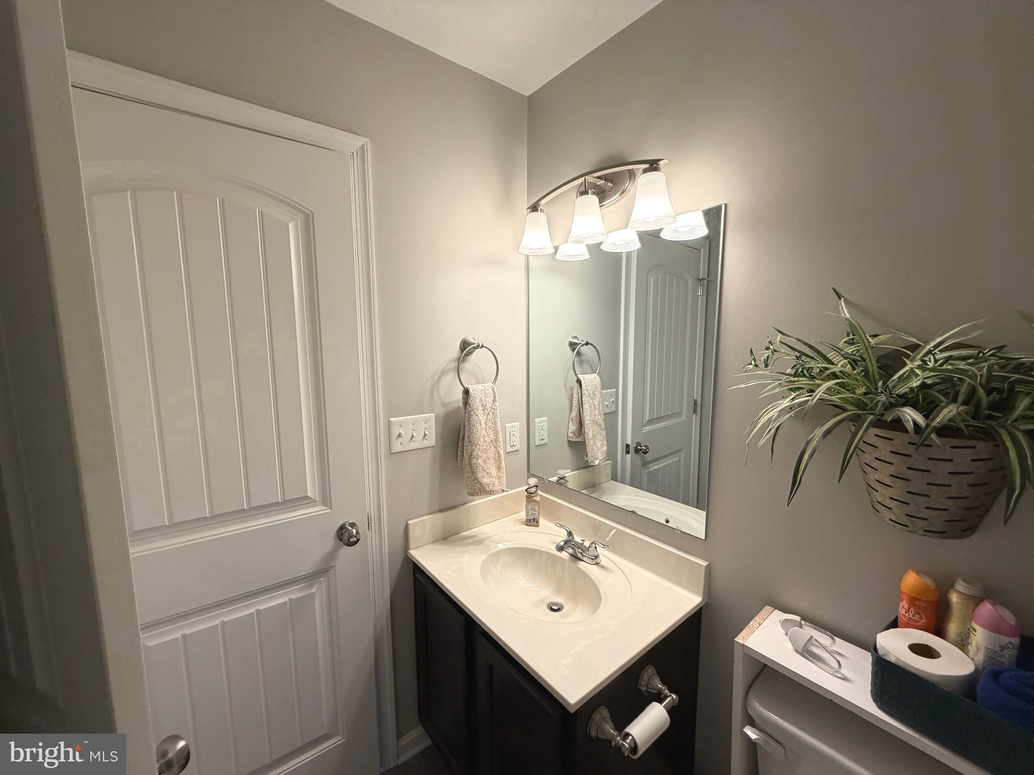 522 Charles Avenue Hanover, PA 17331 - Photo 48 of 59 a bathroom with a sink vanity and a mirror