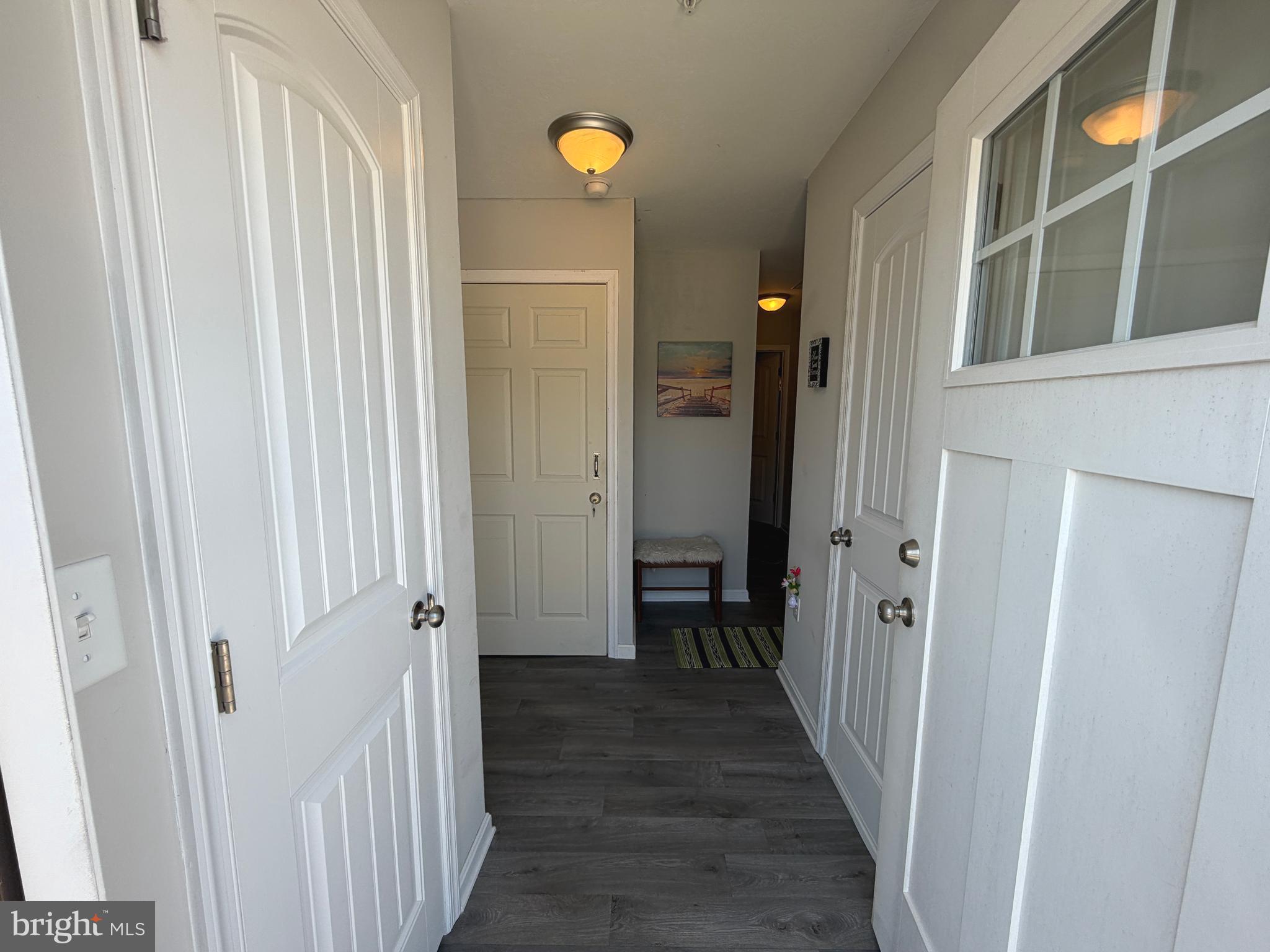 522 Charles Avenue Hanover, PA 17331 - Photo 5 of 59 a view of a hallway with a door and wooden floor