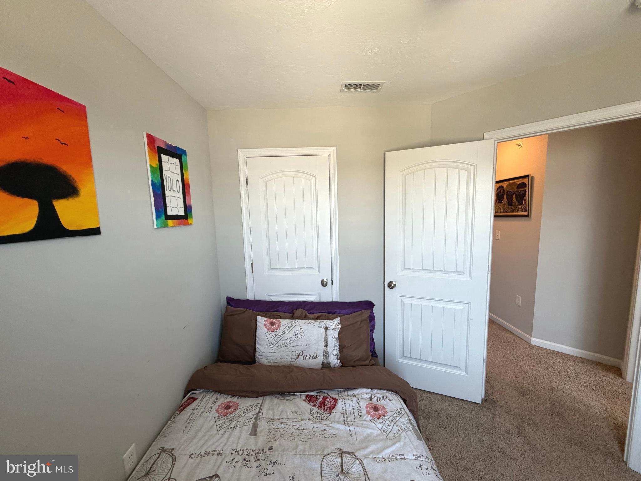 522 Charles Avenue Hanover, PA 17331 - Photo 58 of 59 a bedroom with a bed and painting on the wall