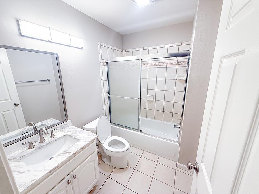 84 Rancho Drive, Unit H San Jose, CA 95111 - Photo 8 of 10 a bathroom with a sink a toilet and shower