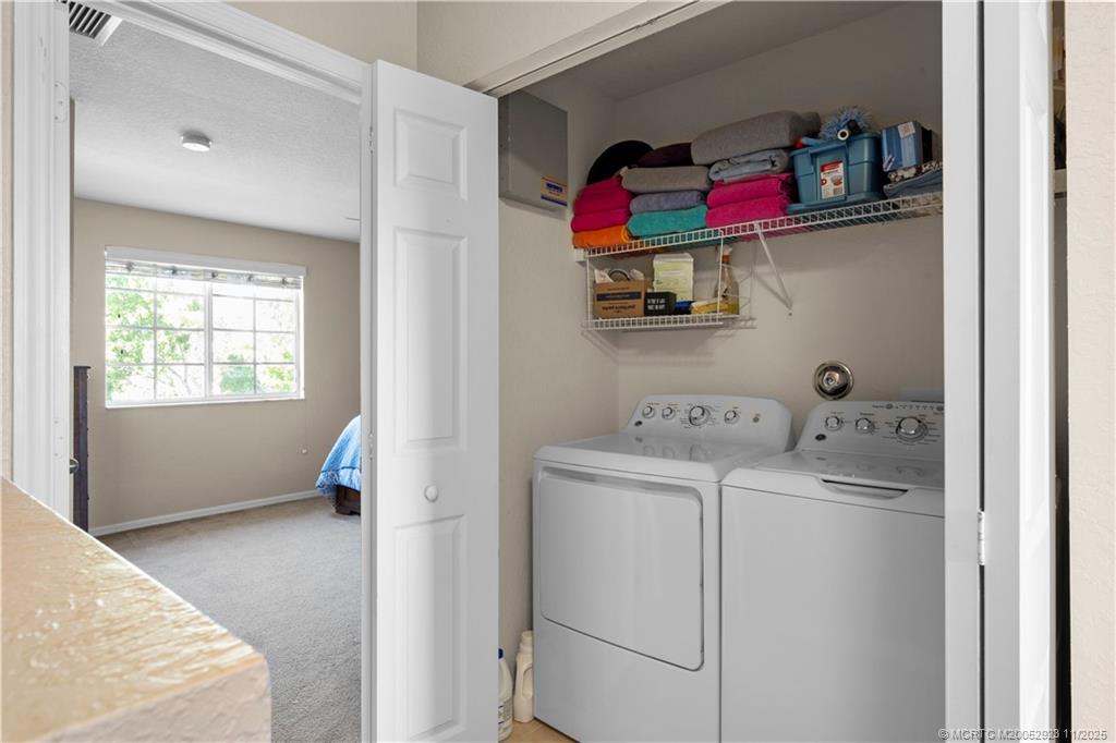 5321 Southeast Jennings Lane Stuart, FL 34997 - Photo 16 of 19 a view of walk in closet and window