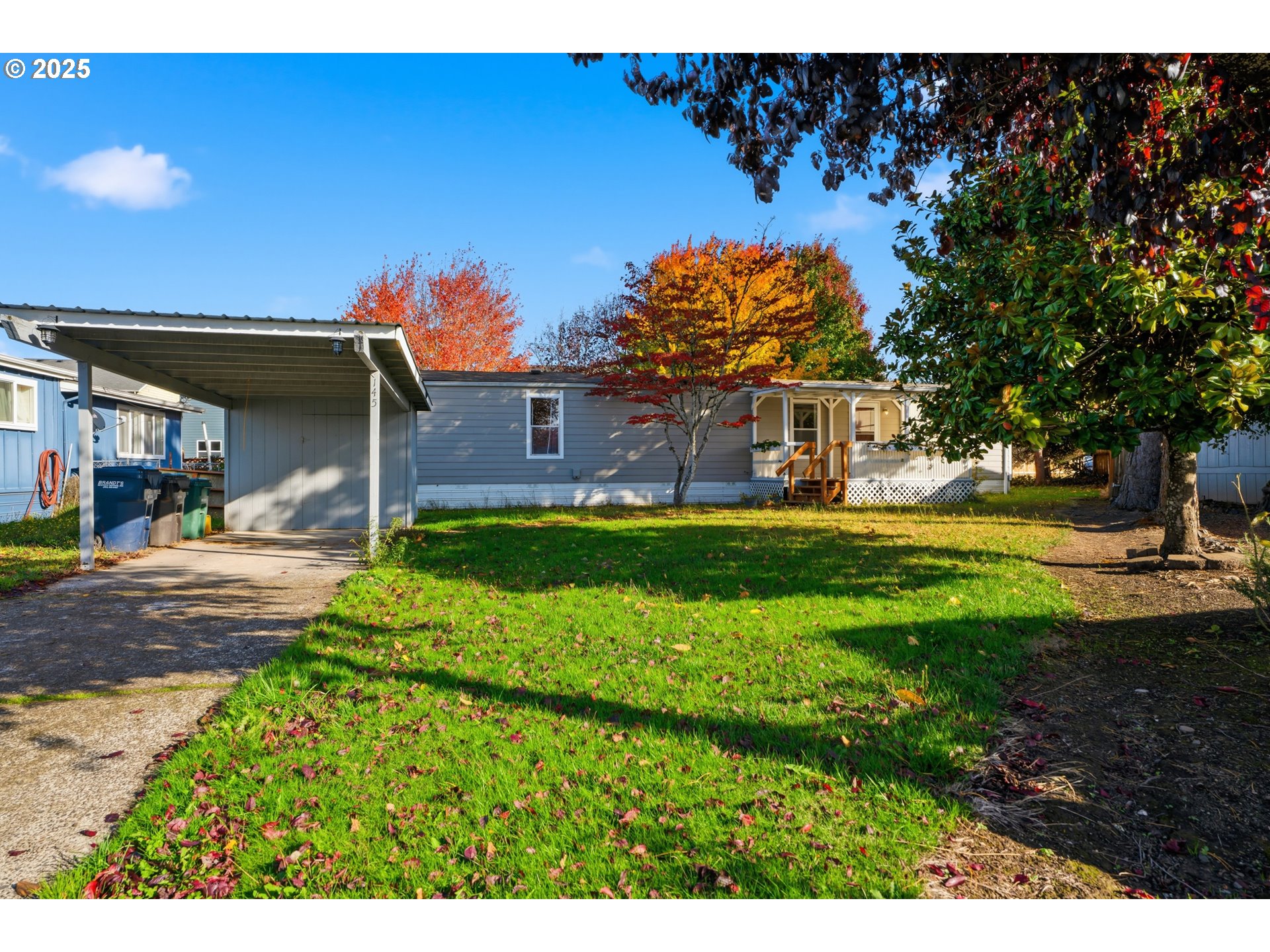 a view of a house with a big yard