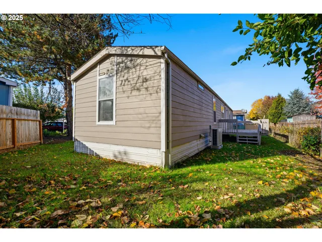 a view of a balcony with wooden floor