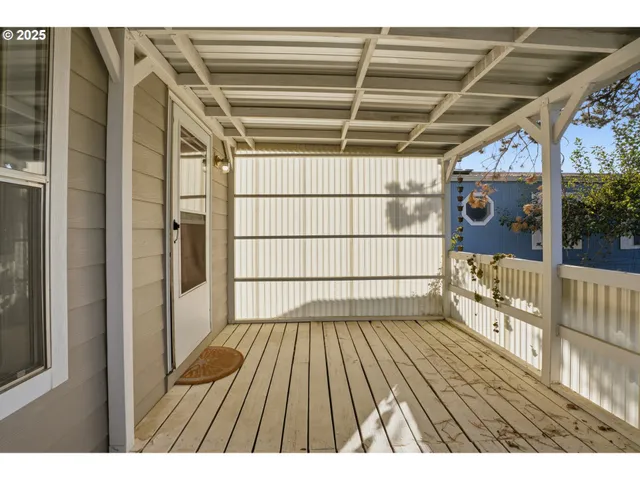 a view of wooden floor with a window