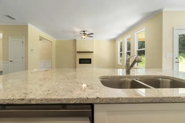 a bathroom with bathtub sink and mirror