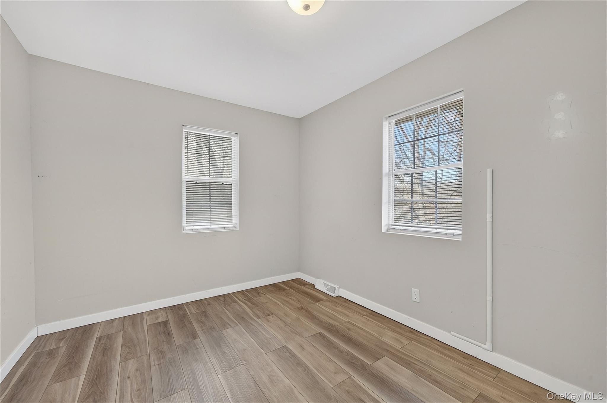 12 Revere Road Monroe, NY 10950 - Photo 18 of 30 Spare room with baseboards and light wood-style floors