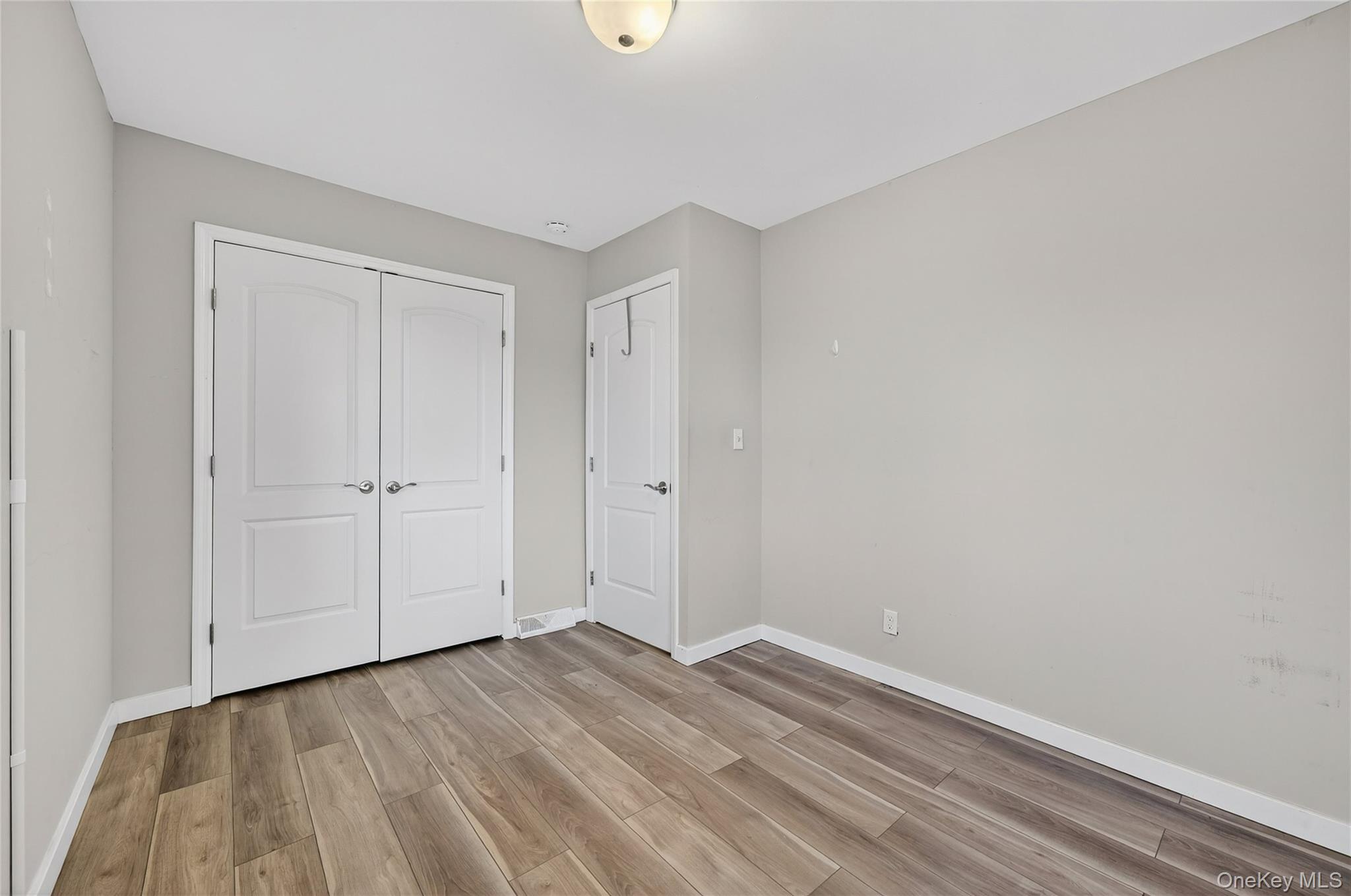 12 Revere Road Monroe, NY 10950 - Photo 20 of 30 Unfurnished bedroom with a closet and light wood-type flooring