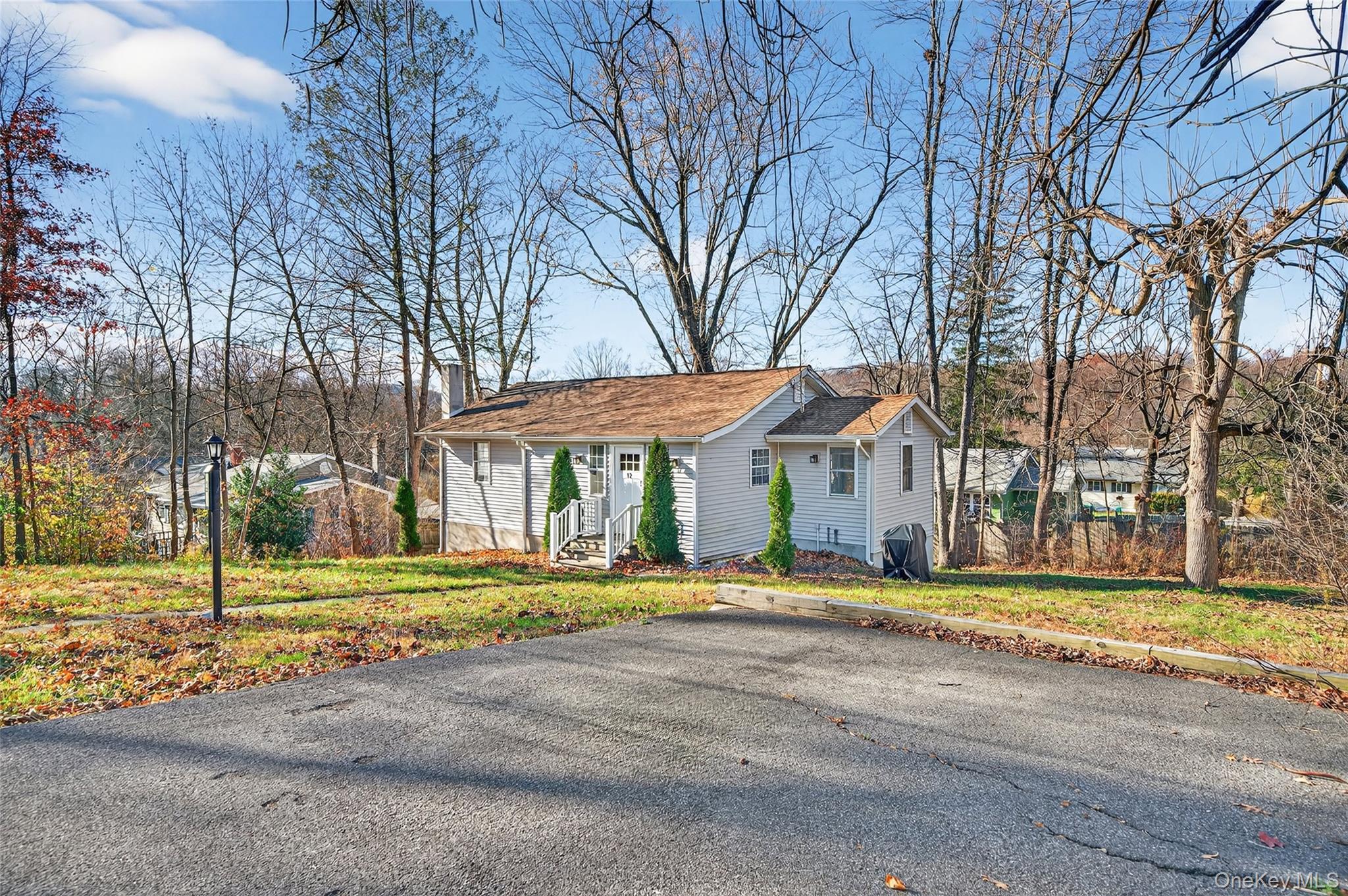 12 Revere Road Monroe, NY 10950 - Photo 2 of 30 View of front of house with a front yard and a chimney