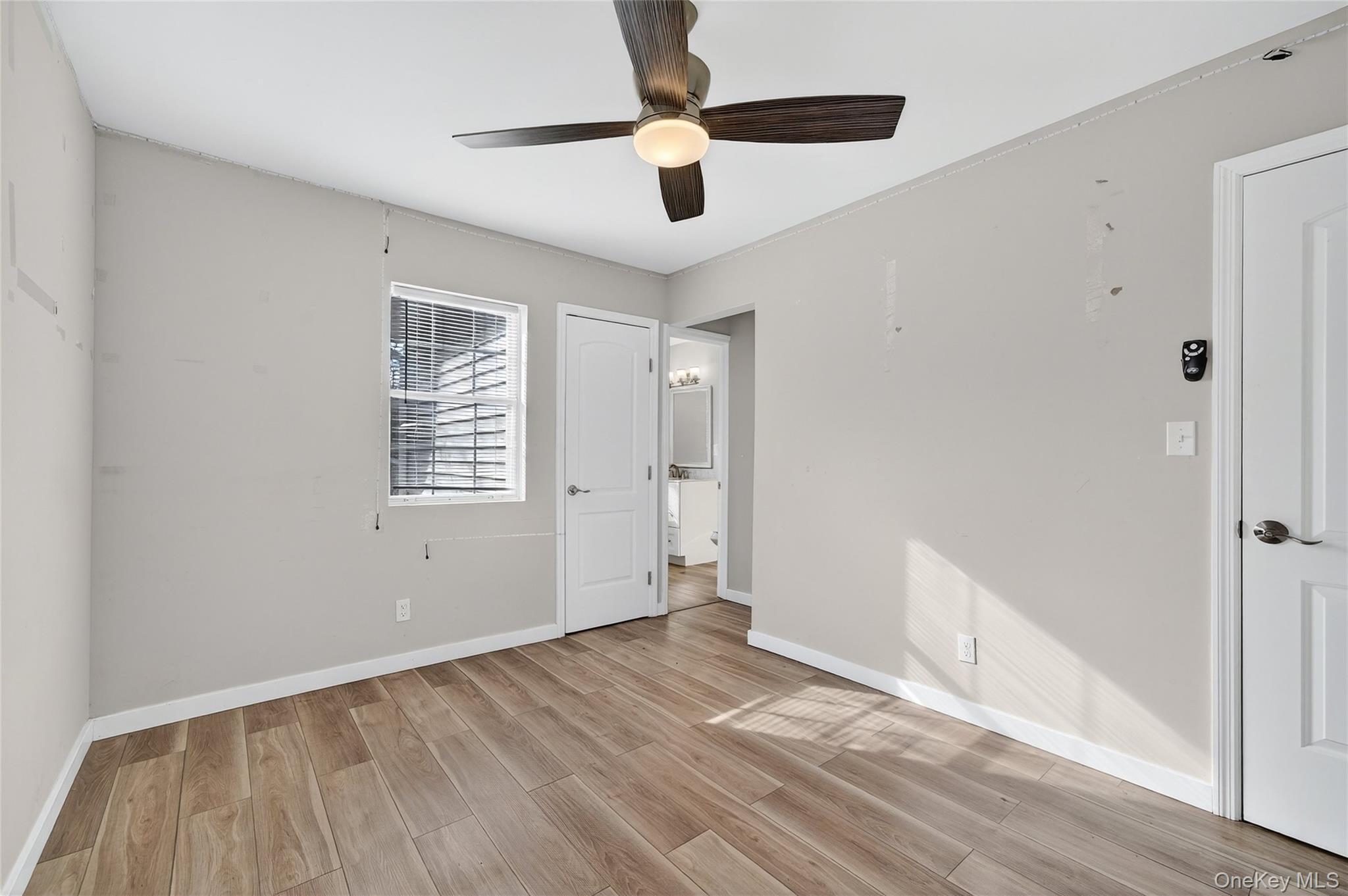 12 Revere Road Monroe, NY 10950 - Photo 22 of 30 Unfurnished bedroom featuring light wood-style floors and ceiling fan
