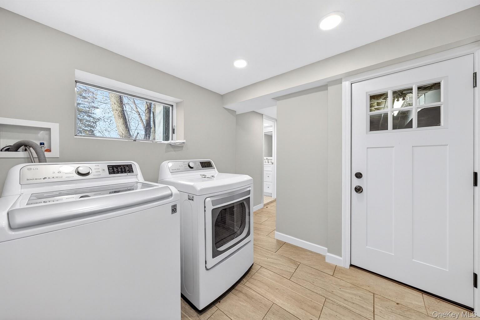 12 Revere Road Monroe, NY 10950 - Photo 28 of 30 Washroom with washing machine and clothes dryer, recessed lighting, and light wood-type flooring