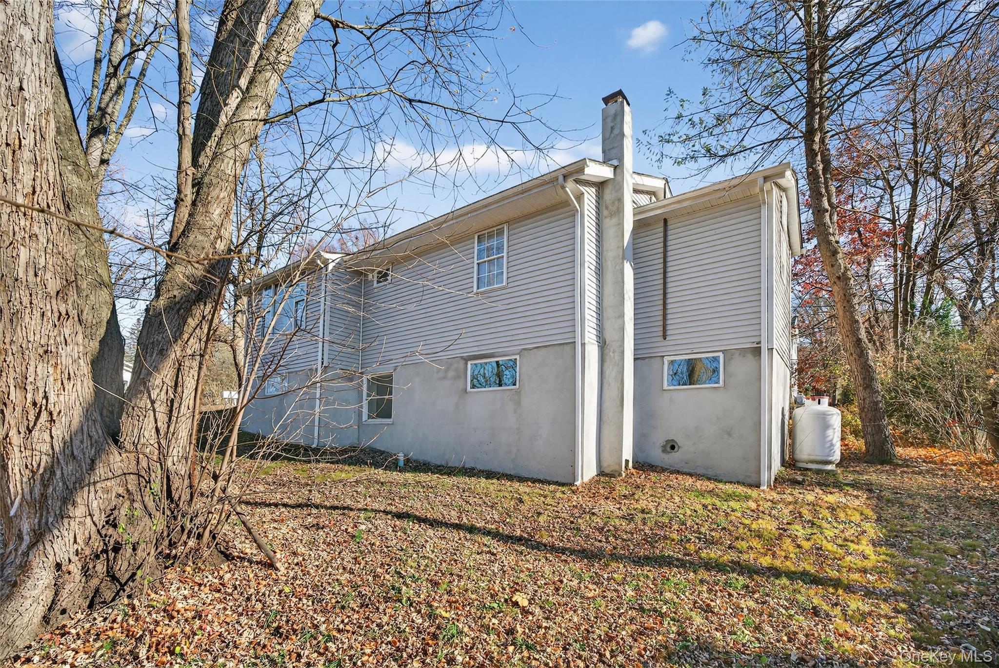 12 Revere Road Monroe, NY 10950 - Photo 29 of 30 Rear view of property with a chimney