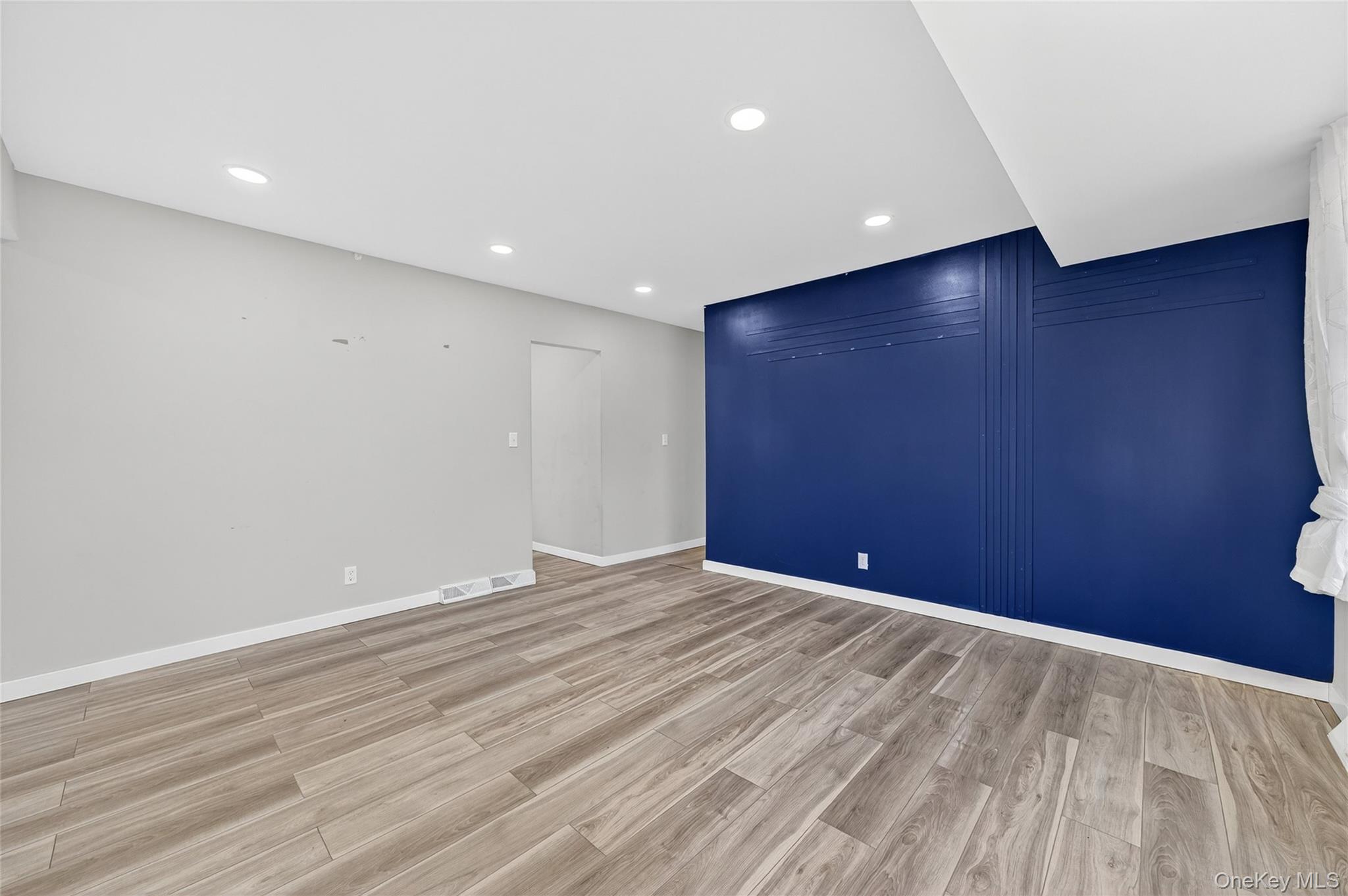 12 Revere Road Monroe, NY 10950 - Photo 6 of 30 Empty room featuring recessed lighting and light wood-type flooring