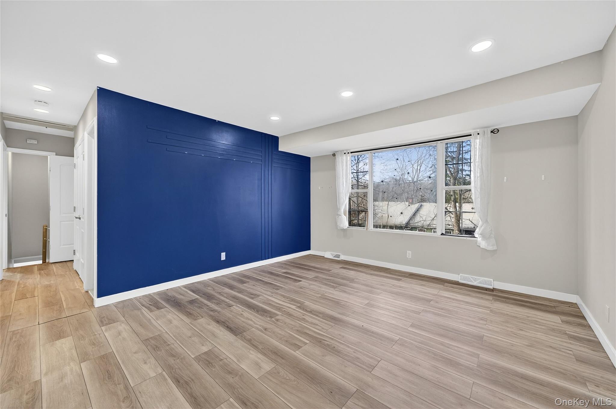 12 Revere Road Monroe, NY 10950 - Photo 7 of 30 Unfurnished room featuring recessed lighting and light wood finished floors