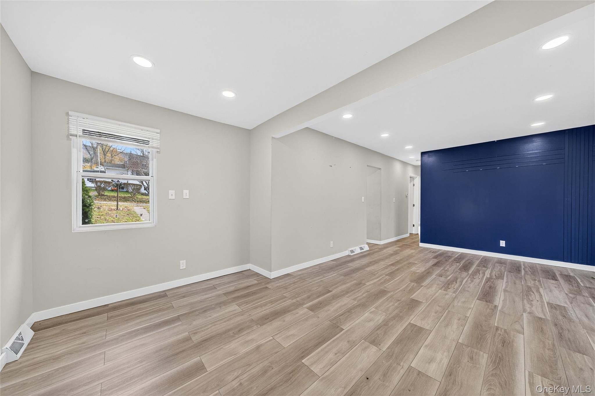 12 Revere Road Monroe, NY 10950 - Photo 9 of 30 Empty room featuring recessed lighting and light wood-type flooring
