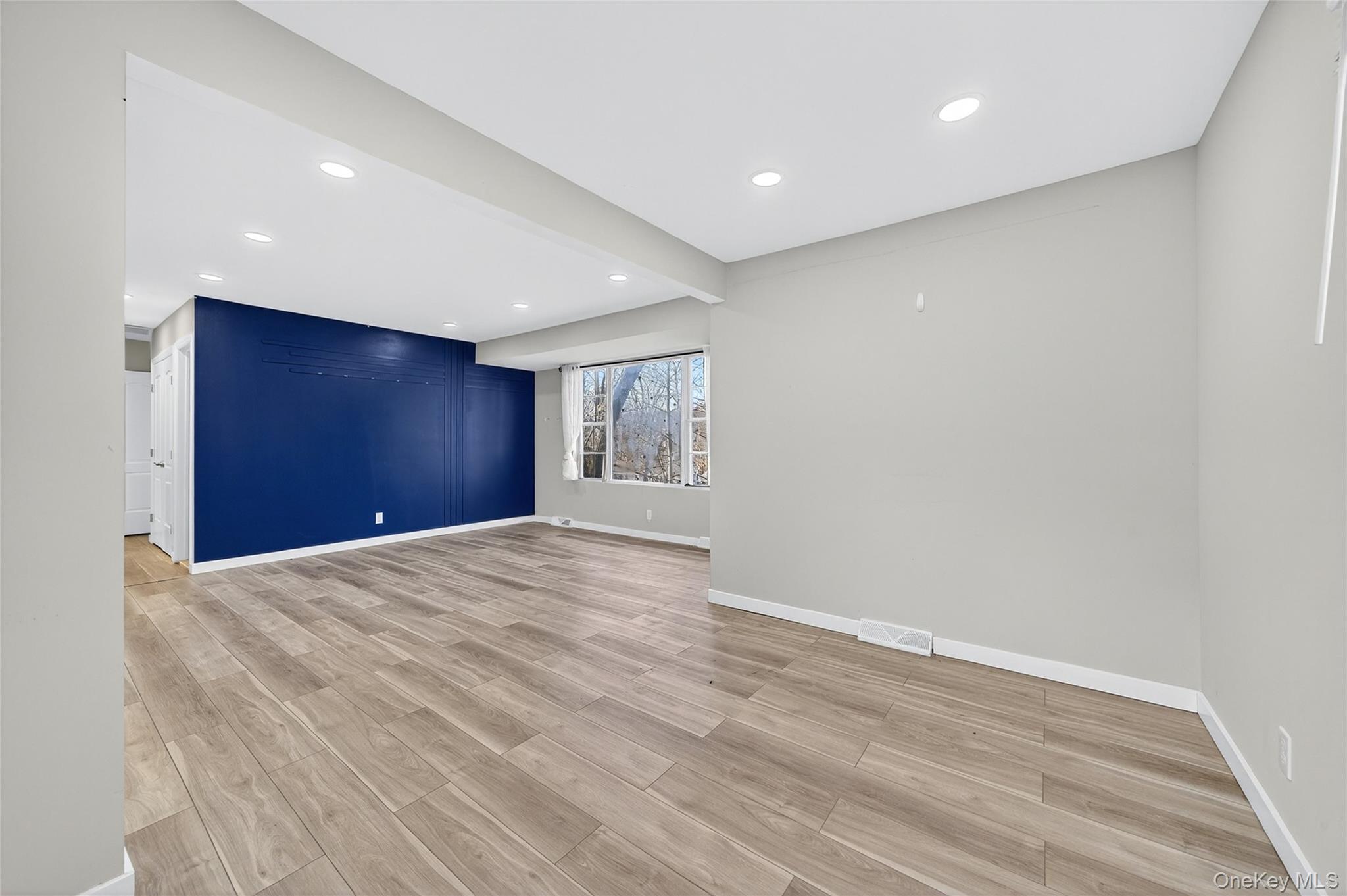 12 Revere Road Monroe, NY 10950 - Photo 10 of 30 Spare room featuring recessed lighting and light wood-style floors