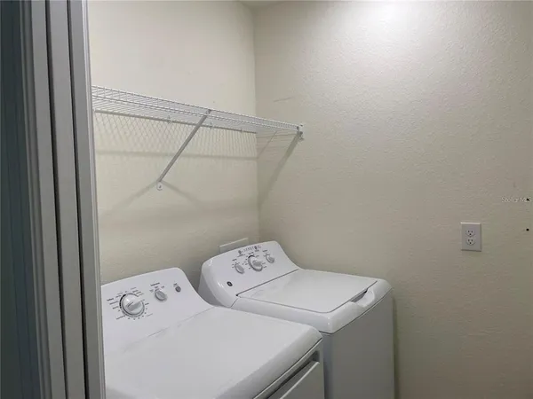 a view of outdoor space and swimming pool