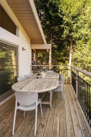 a patio with table and chairs